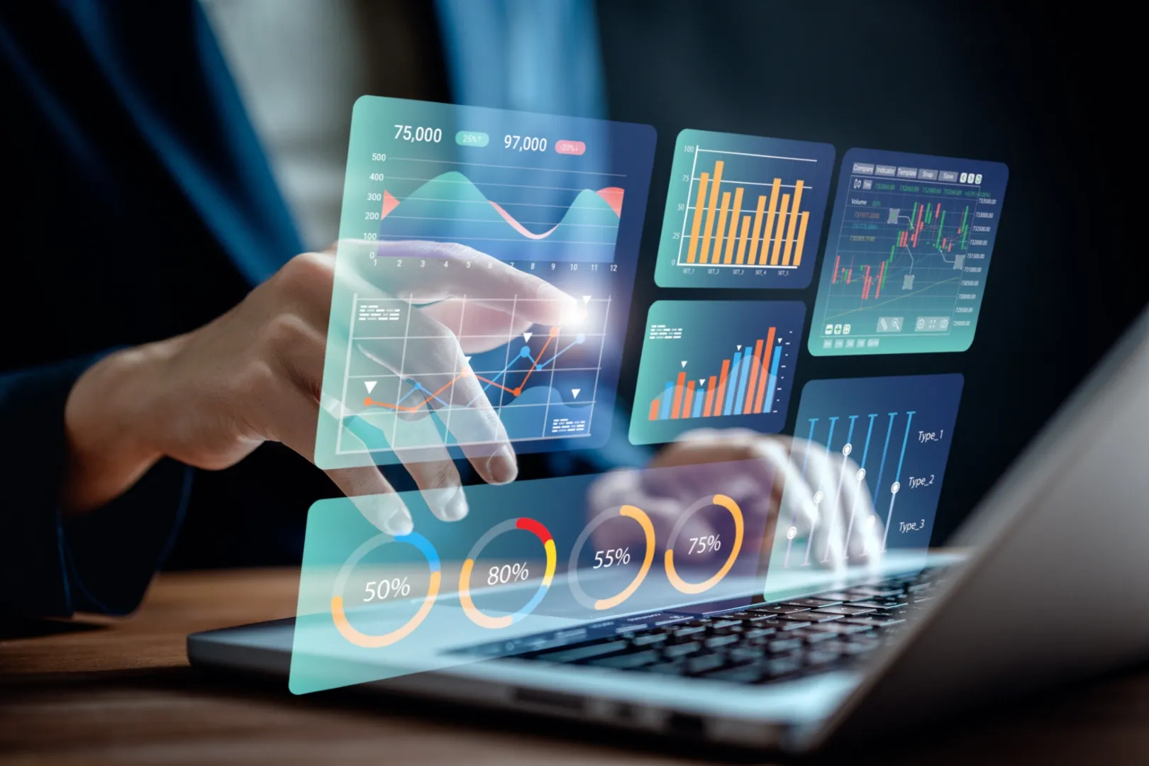 Person using laptop with projected data charts, symbolizing predictive analytics for employee turnover.